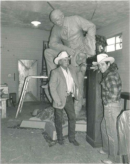 Gordon Selby (who served as the model for the Memorial bronze) poses with artist Wes Chapman.